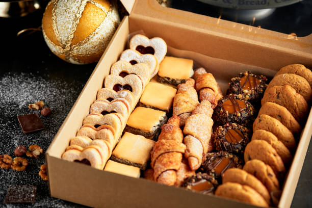 istock Take away box filled with mini Christmas pastry cakes 1282546995