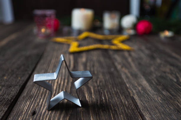 istock Christmas background stars burning candles, close up 1282548241