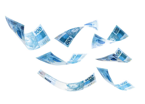 istock 100 reais banknotes falling, one hundred reais banknote from brazil on isolated white background 1282549352