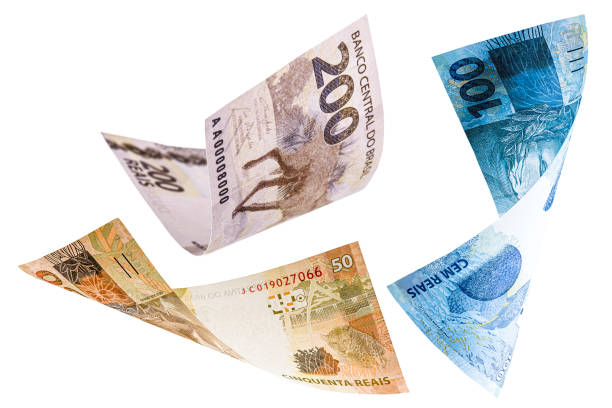 istock many banknotes from brazil falling on white background, two hundred, one hundred and fifty reais in free fall 1282549423