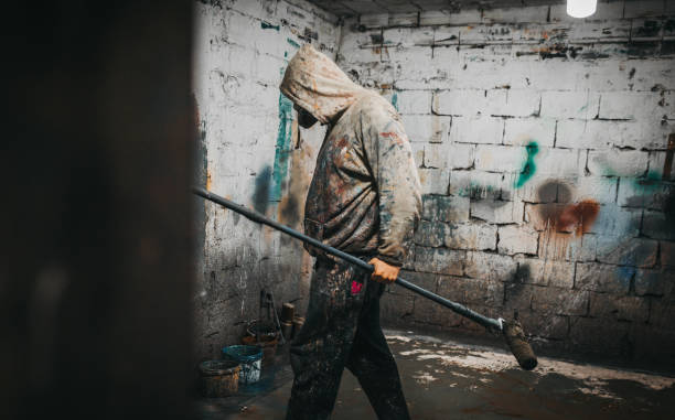 istock An artist with a crazy look and a gas mask 1282551153