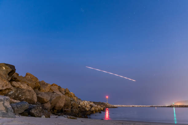 istock Dawn has yet to break over coastal beach. 1282553857
