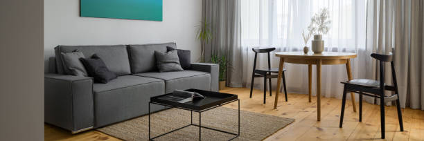 istock Living room with dining table, panorama 1282554753