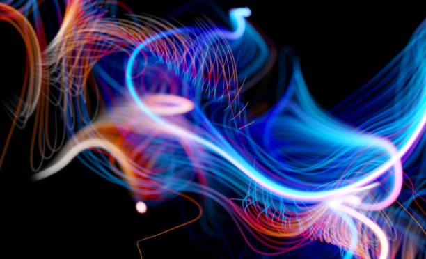 istock 3d render of abstract art 3d background with surreal wavy curve organic neon glowing light lines in blue and orange gradient color with motion blur effect in the dark 1282554945
