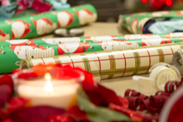 istock Christmas gift wrapping over the table inside latin home 1282555506