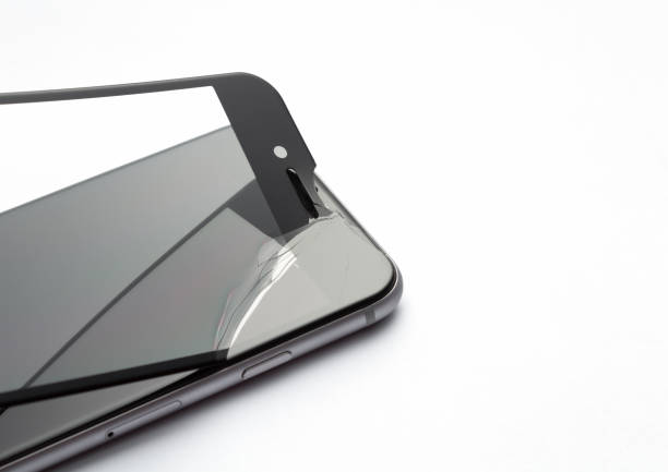 istock Process of replacing protective glass on smartphone on white background. 1282559209