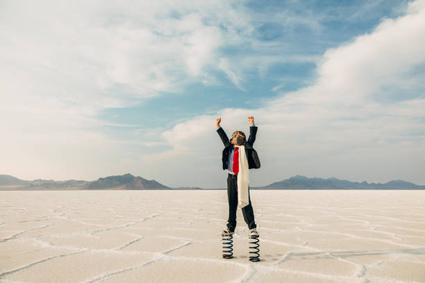 istock Young Business Boy On Springs 1282559867