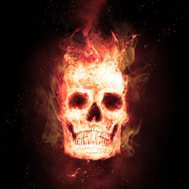istock Burning skull in flames in the darkness 1282560620