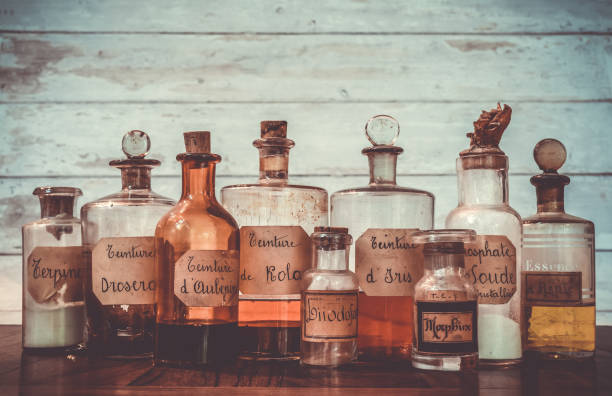 istock apothecary pots with ingredients for medicine 1282561105