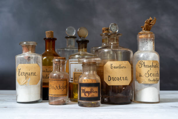 istock apothecary pots with ingredients for medicine 1282561113
