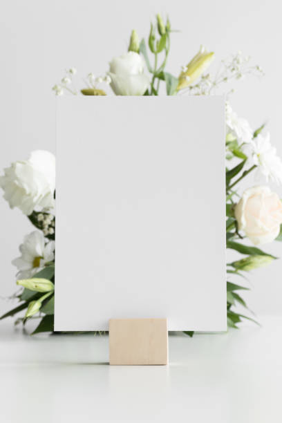 istock Wedding table number card mockup with a floral arrangement. 1282563383