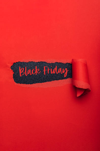 istock Black Friday text in paper hole 1282564602