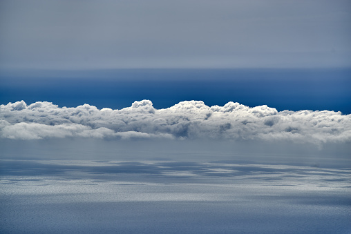 Panorama of the sea and sky from a high point. Black sea. Clouds and sun rays