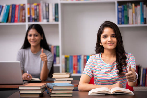 istock Adult Student in library - stock photo 1282567064