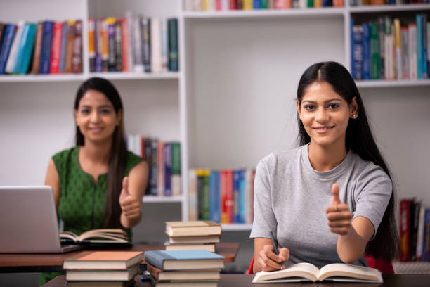 istock Adult Student in library - stock photo 1282567152