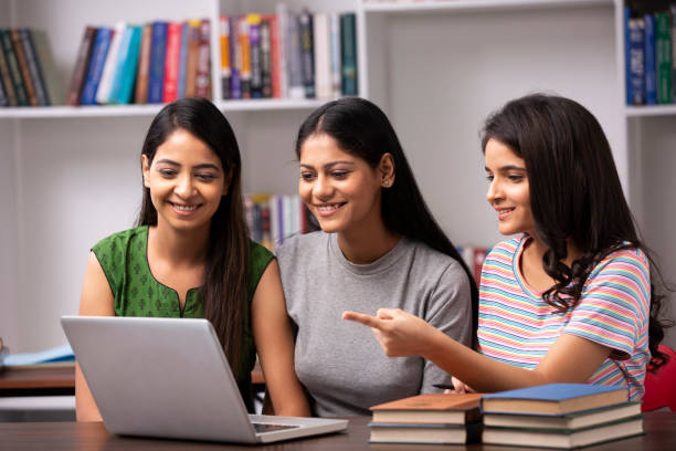 istock Adult Student in library - stock photo 1282567385