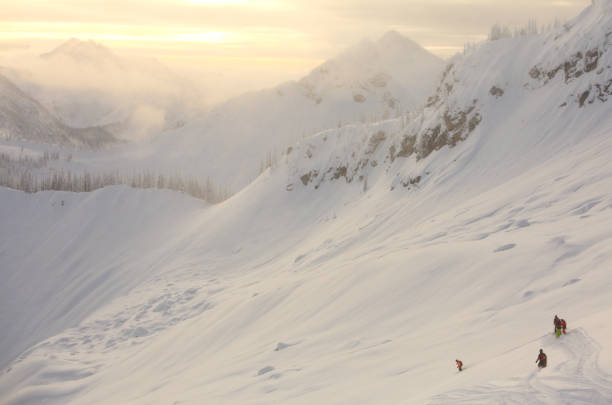 A ski touring group in the Canadian Rockies. Image taken near Revelstoke, British Columbia.