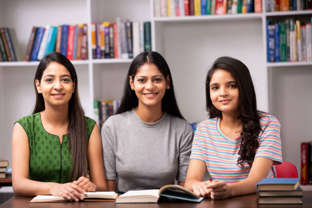 istock Adult Student in library - stock photo 1282568077