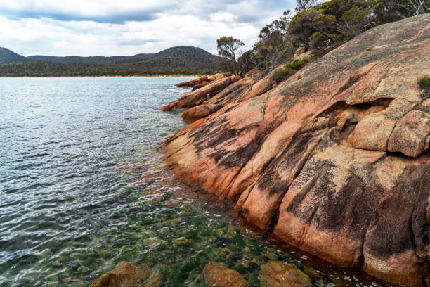 Honeymoon Bay, Freycinet National Park at Freycinet Peninsula Tasmania, Australia Tasmania, Australia. honeymoon bay stock pictures, royalty-free photos & images