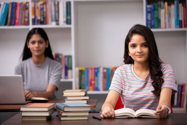 istock Adult Student in library - stock photo 1282569663