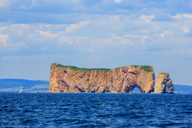 Rocher Percé in Percé, Quebec, Canada Photo of Rocher Percé taken from a boat. gaspe peninsula stock pictures, royalty-free photos & images