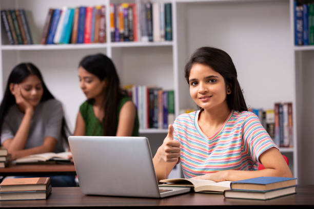 istock Adult Student in library - stock photo 1282571409