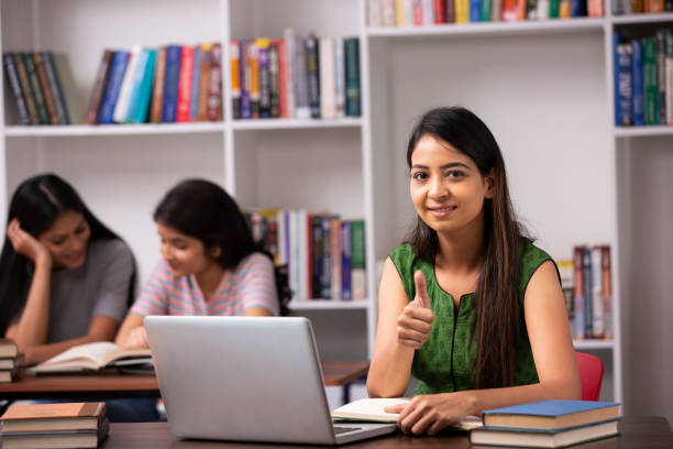istock Adult Student in library - stock photo 1282571440