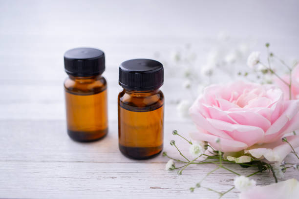 istock Essential oil and pink rose. Aromatherapy image. 1282571604