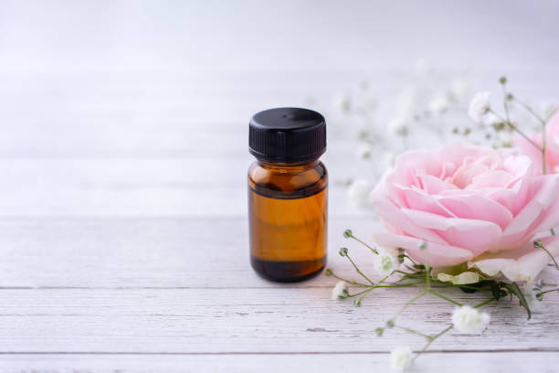 istock Essential oil and pink rose. Aromatherapy image. 1282571605