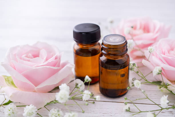 istock Essential oil and pink rose. Aromatherapy image. 1282571609