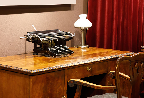 Old desk, typewriter, room