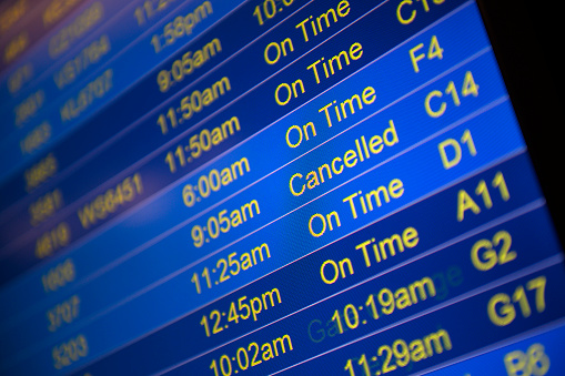 Flight status screen at airport