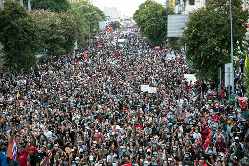 Crowds of protesters march in Bangkok, Thailand