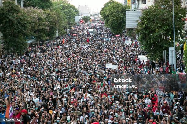 Crowds Of Protesters March In Bangkok Thailand Stock Photo - Download Image Now - Protest, Crowd of People, Political Rally