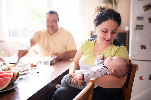 istock Mother with her baby on breakfast. 1282580524