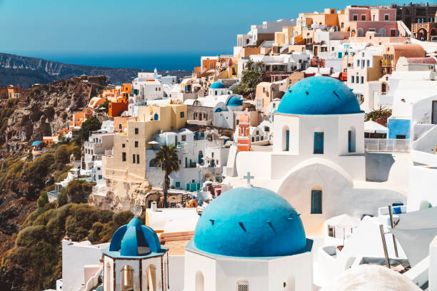 istock Array of colorful buildings on the cliff in Oia, Santorini 1282581518