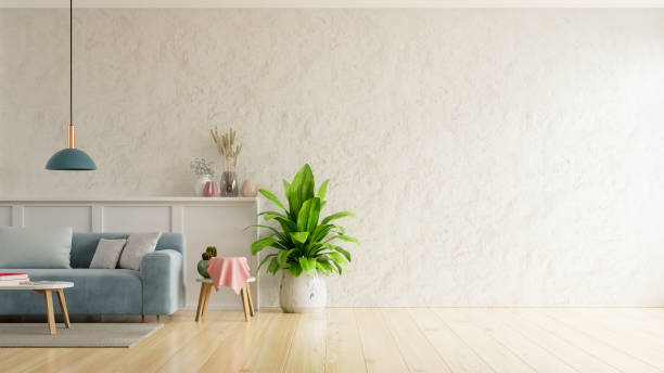 istock White plaster wall living room have sofa and decoration 1282589140