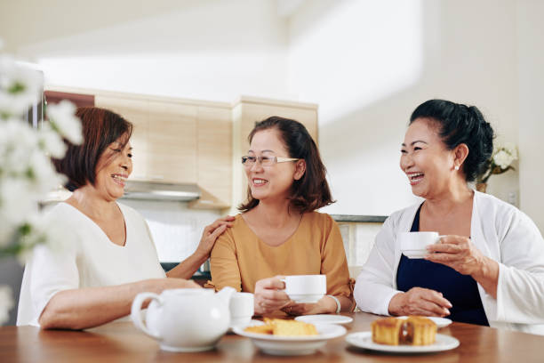 istock Chit-chating seniors at home 1282589700