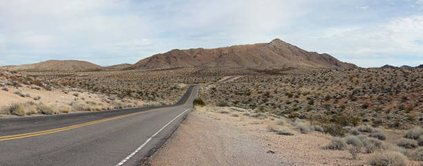 istock Valley of Fire highway into distant mountain 1282590534