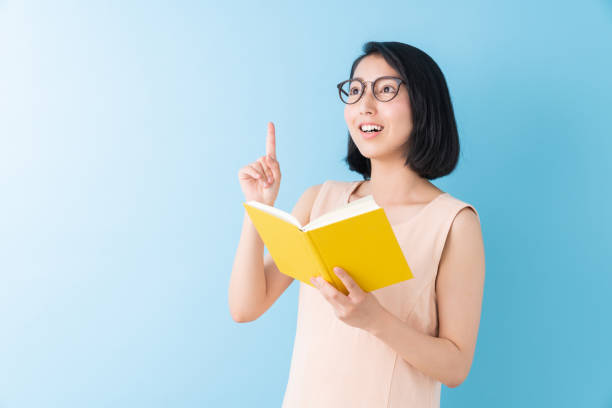istock asian woman who reads a book 1282593658