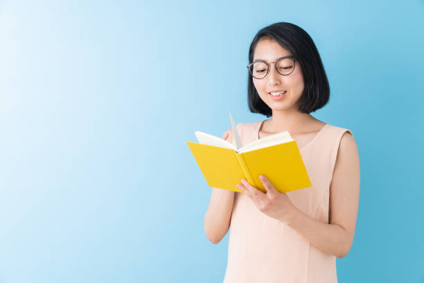 istock asian woman who reads a book 1282593728