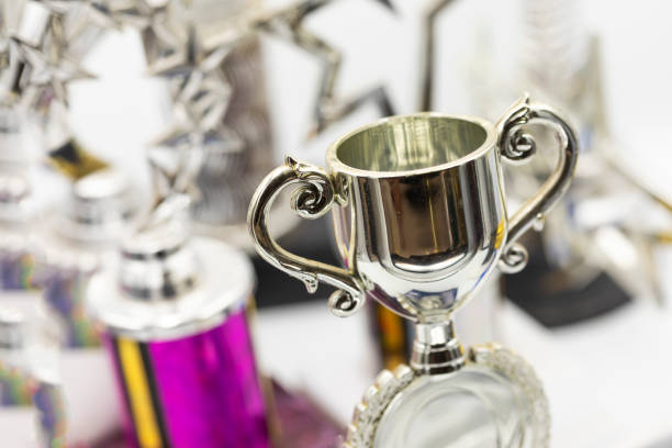 istock Success Concept WIth Brightly Lit Trophies 1282596261