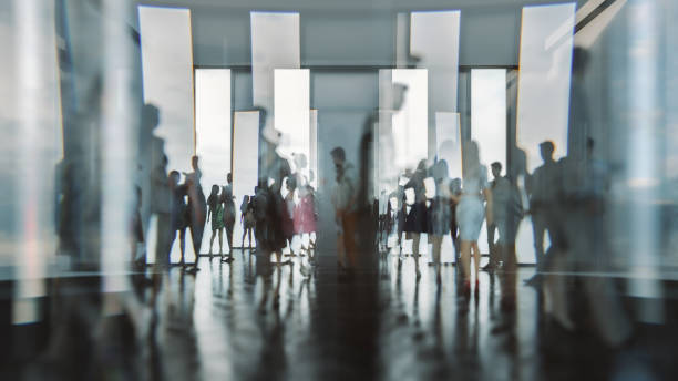 istock Abstract people silhouettes against glass 1282596290