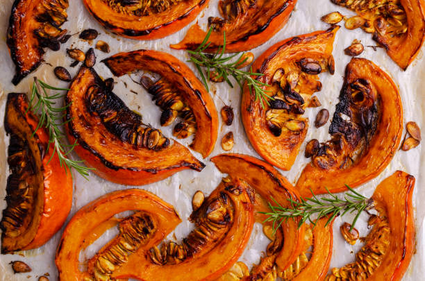 istock Baked pumpkin slices with seeds 1282599067