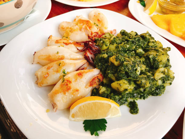 istock Grilled squids with chard and potatoes in Piran, Slovenia. 1282603970