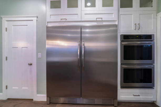 istock Large double door fridge with fitted ovens 1282609983