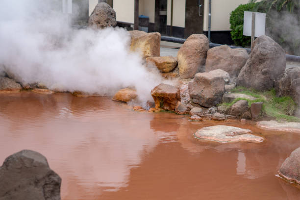 The Chinoike Jigoku (Blood Pond Hell) is one of eight Beppu hot spring (onsen). the most famous at beppu city in autumn The Chinoike Jigoku (Blood Pond Hell) is one of eight Beppu hot spring (onsen). the most famous at beppu city in autumn. Oita, Kyushu, Japan bathroom geyser stock pictures, royalty-free photos & images