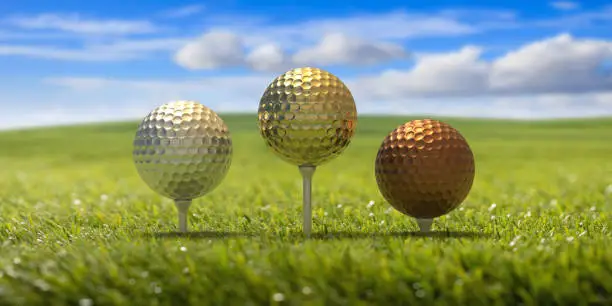 Golf winners victory podium, world cup, champion concept. Golfballs gold, silver and bronze first, second and third places, green lawn, blue sky background. 3d illustartion