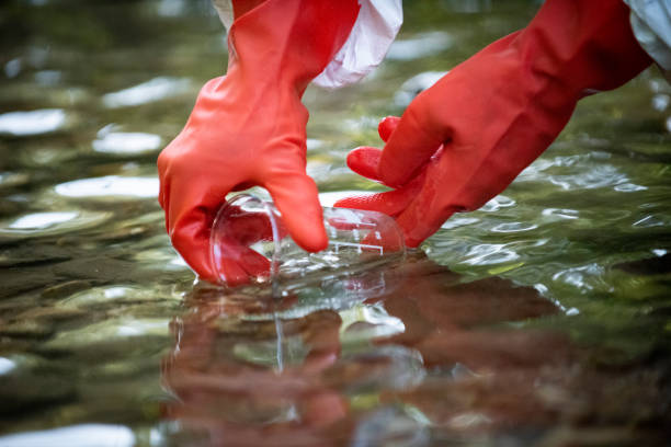 istock Scientist examining toxic water samples 1282613502