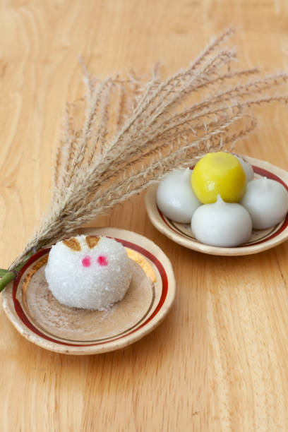 mochi cakes and pampas grass stock photo